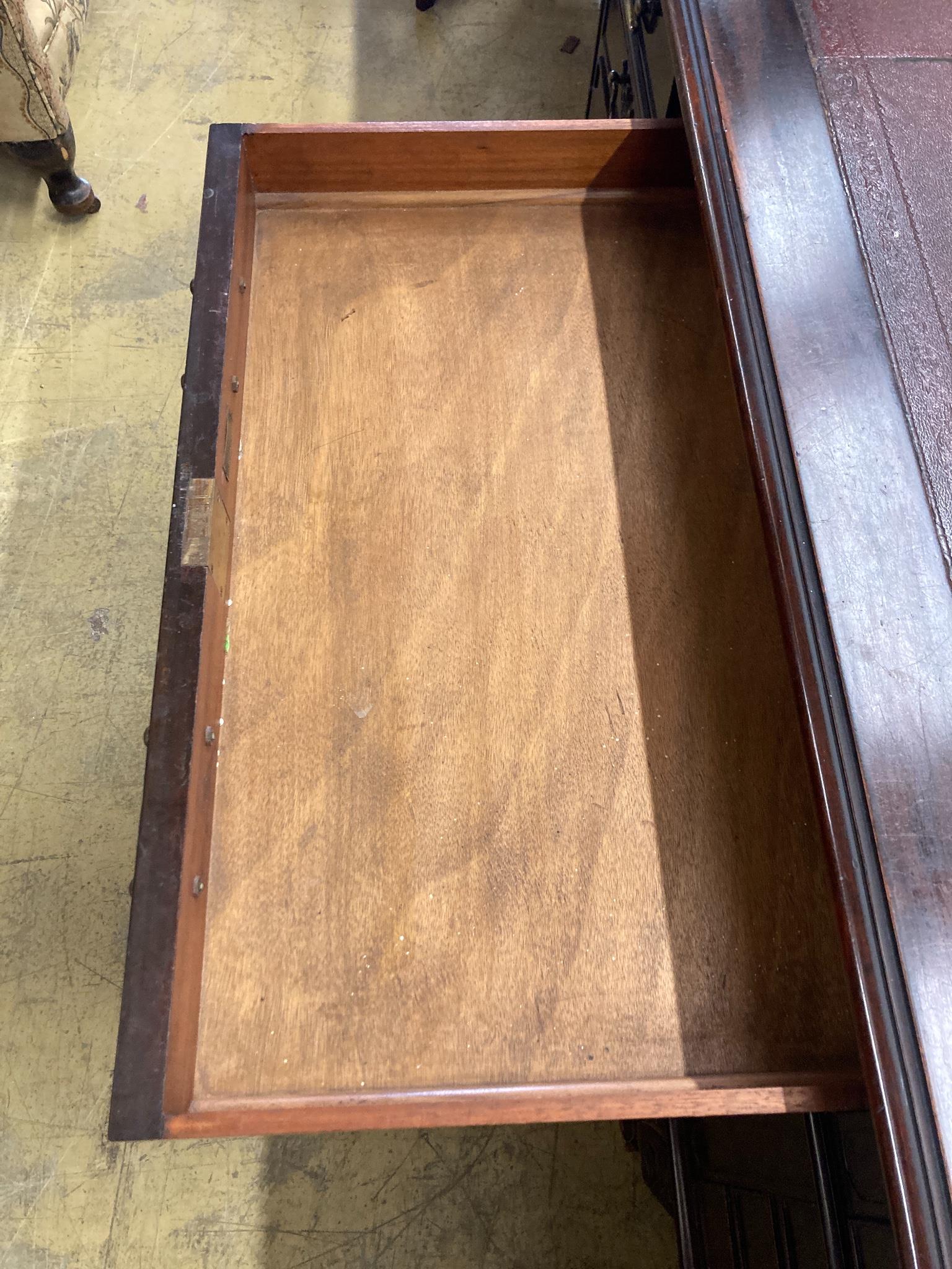 A 1920's Chippendale revival mahogany pedestal desk, length 166cm, depth 106cm, height 80cm